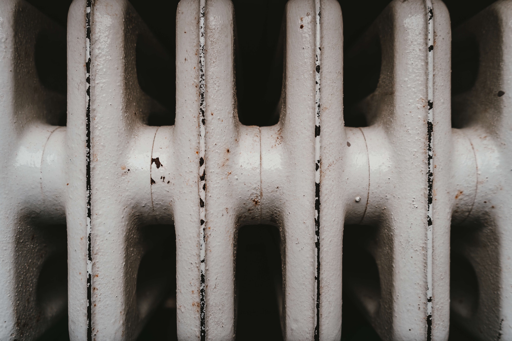 Old radiator close up - Photo by Julian Hochgesang on Unsplash
